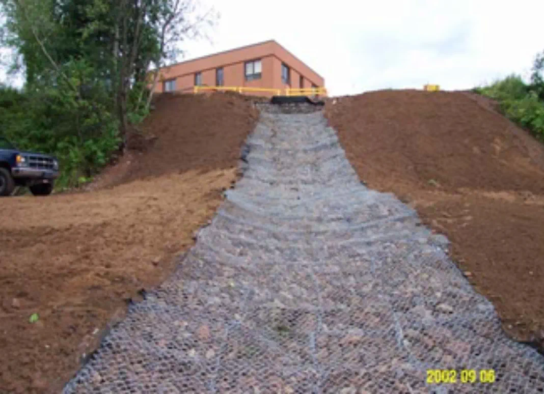 An 84 linear foot storm water conveyance channel was installed to reduce erosion An 84 linear foot storm water conveyance channel was installed to reduce erosion